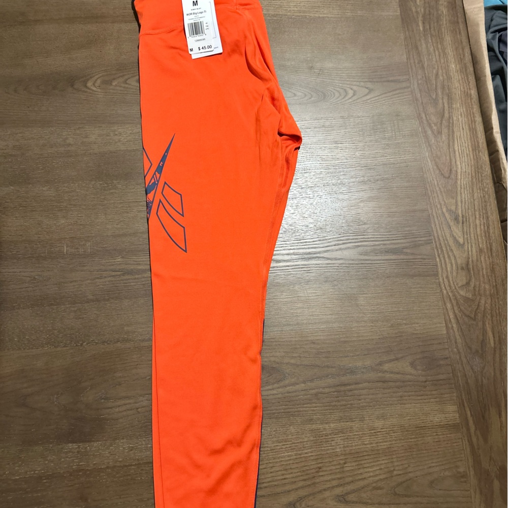 Reebok orange and black leggings #activewear